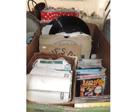 A selection of vintage postcards and records etc