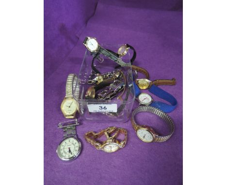 A section of lady's fashion wrist watches including Timex and Sekonda, and a nurse's watch by Lorus