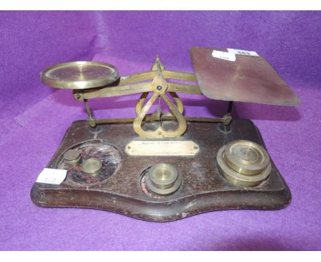 A vintage post office letter balance scale set