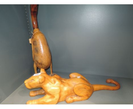 A two vintage treen figures a lion and duck
