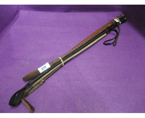 A selection of vintage horse riding crops
