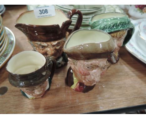 A selection of vintage character jugs by Royal Doulton