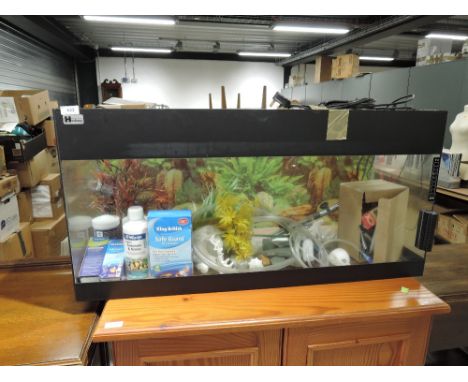 A fish tank and accessories, labelled Hockney