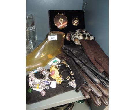 A selection of vintage ladies dress items including jewellery leather gloves etc