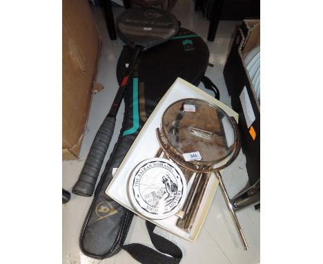 A selection of vintage curios and badminton rackets
