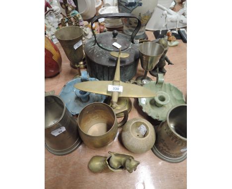 A selection of vintage brass and metal wares including aeroplane 