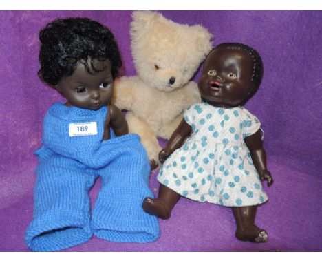 A selection of vintage dolls and similar