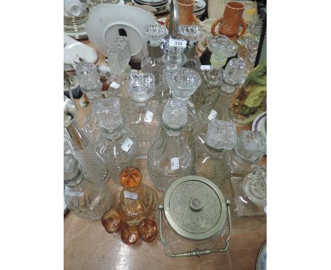 A selection of vintage cut and etched glass decanters