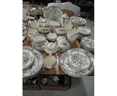 A vintage part dinner service amalgamation in the Indian tree design