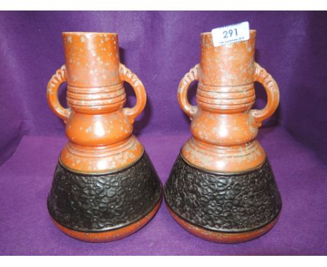 A pair of vintage mantle vase with orange lustre