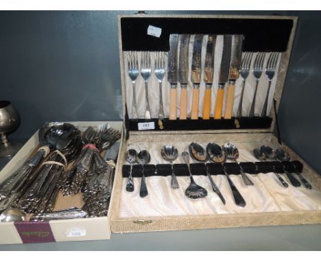 A selection of vintage cutlery flatware and table items including canteen