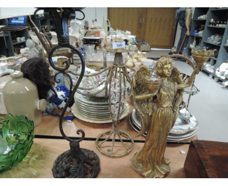 A selection of vintage candle sticks in various designs