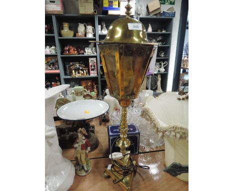 A vintage brass gas style design table lamp