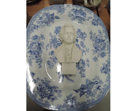 A vintage ceramic bust of Mozart