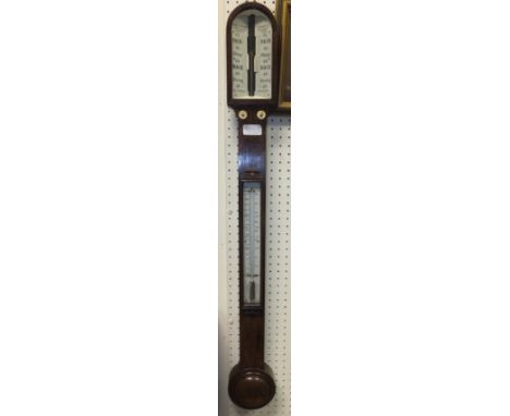 A 19th Century rosewood cased stick barometer, the movement by Negretti & Zambra of London, the dial inscribed "Negretti & Za