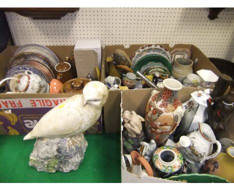 Three boxes of assorted decorative china to include various plates, vases, etc and a painted plaster figure of a falcon inscr