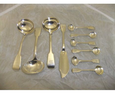 A pair of George V silver fiddle pattern sauce ladles (by JF & EH, London 1913), together with a similar Victorian sauce ladl