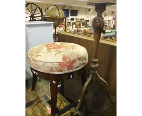 A Victorian mahogany circular stool on four legs, a French walnut stand of inverted baluster shaped column to three legs with