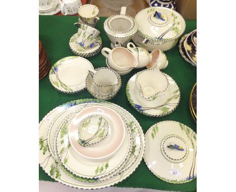 A collection of Burleighware Art Deco tea and dinner wares decorated with tall trees and bluebells, to include teapot, cups a