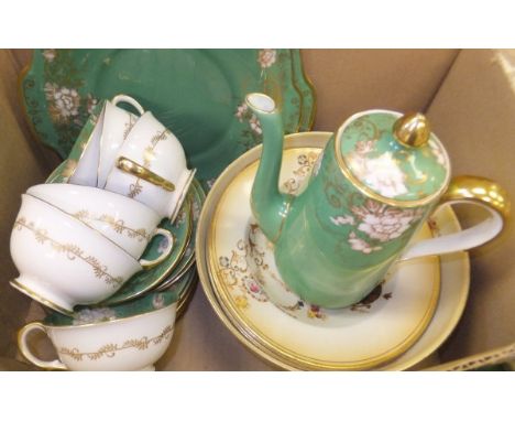 A box containing a small collection of china wares to include a Crown Staffordshire part tea service in green and gilt and a 