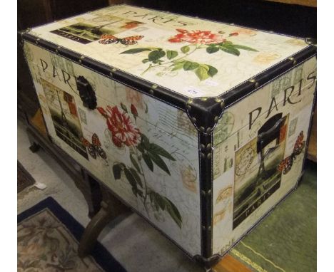 A printed trunk with leatherette corners and brass studs CONDITION REPORTS Trunk is modern, has some general wear and scuffs,