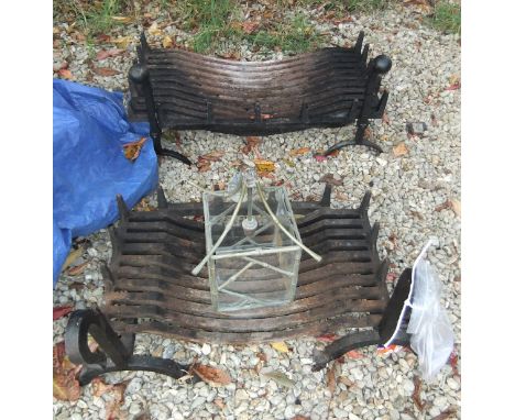 Two large cast iron fire grates, each with a pair of fire dogs, together with a metal framed square hanging lantern in the Ch