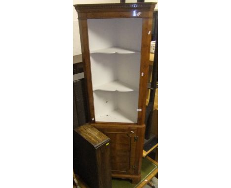 A yew wood sofa coffee table with green leather insert top, yew wood corner display cabinet with three open shelves above a c