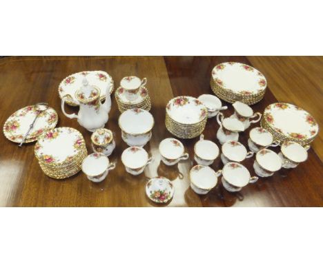 A collection of Royal Albert "Old Country Roses" pattern dinner and tea wares to include nine dinner plates, three serving pl
