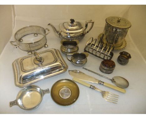 A box of plated wares to include a biscuit tin, three piece tea set, entrée dish, assorted cutlery, dish ring, etc