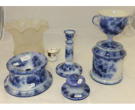 A collection of late 19th Century flow blue pottery gentleman's companion set to include twin-handled jar and cover as a pede
