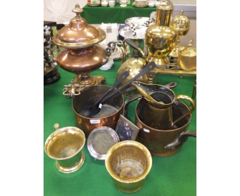 A 19th Century copper samovar, two iron handled copper saucepans, brass jug, two brass mortars, two photograph frames, three 