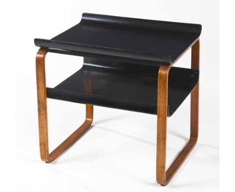 A BLACK LACQUER AND BEECH MODEL 915 TABLE DESIGNED BY ALVAR AALTO FOR FINMAR LTD each curved shelf on bent square-section leg