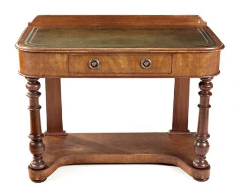 A VICTORIAN MAHOGANY DRESSING TABLE the rectangular moulded top with a leather-inset writing surface surmounted by a back gal