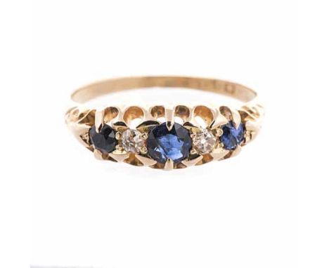 A SAPPHIRE AND DIAMOND RING the scalloped band centred with circular-cut sapphires weighing approximately 0.28cts in total, i