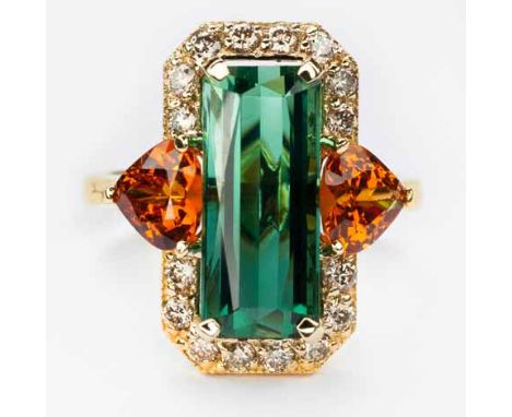 A GREEN TOURMALINE, DIAMOND AND MANDARIN GARNET RING centered with a rectangular scissors-cut green tourmaline weighing appro