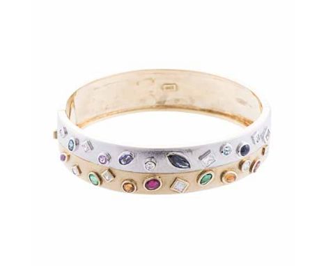 A GOLD AND GEM-SET BANGLE of oval hinged form, the top section composed of a white and yellow gold band of satin finished, em
