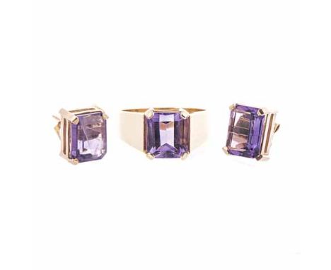 A PAIR OF AMETHYST EAR STUDS each claw-set with a rectangular step-cut amethyst weighing approximately 7.64cts in total, acid