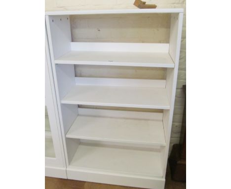 A white open shelf unit