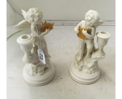 A pair of Franklin Mint Parian style candlestick models