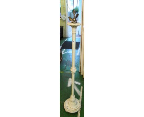 A white painted standard lamp