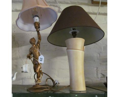 A spelter lamp in the form of a turbaned man and a modern table lamp