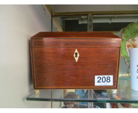 A 19th Century mahogany tea caddy (slight dent to top)