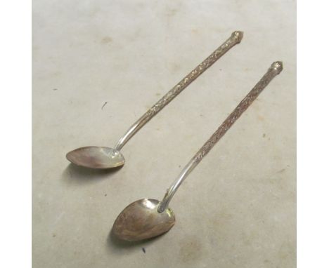 A silver butter knife, a three piece silver condiment set (boxed), two long spoons and three silver spoons