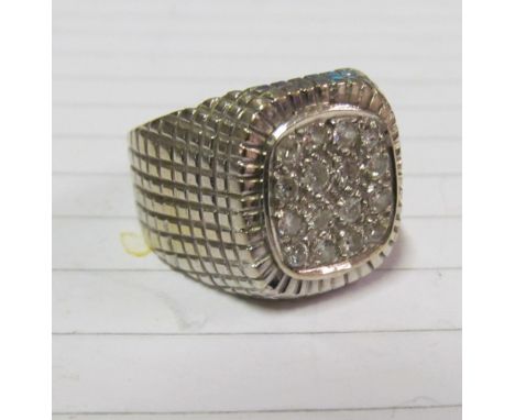 A white metal diamond ring size R