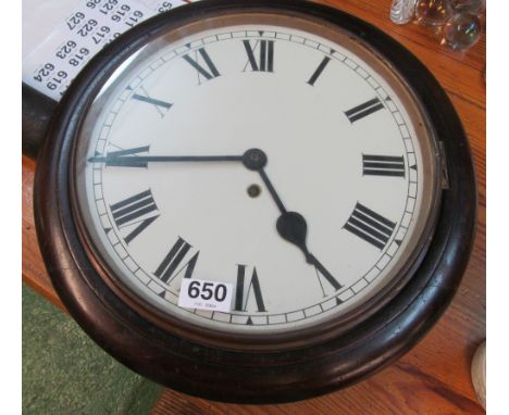 A mahogany wall clock no pendulum