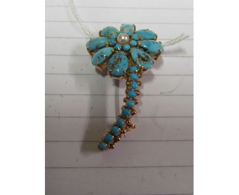 A turquoise and seed pearl flower brooch