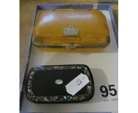 A French tortoiseshell effect box which opens to reveal a horse jumping a fence, marked Paris and a mother of pearl ebonised 