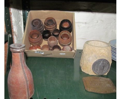 Various treen miniature barrels made from the teak decking of various famous ships, a leather flask, brass plaque and a stone