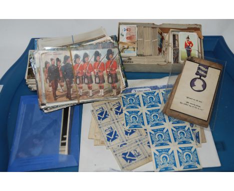 A tray lot of various post cards, cigarette cards, Victoria in Memoriam card and Rabbie Burns related stamps Condition Report