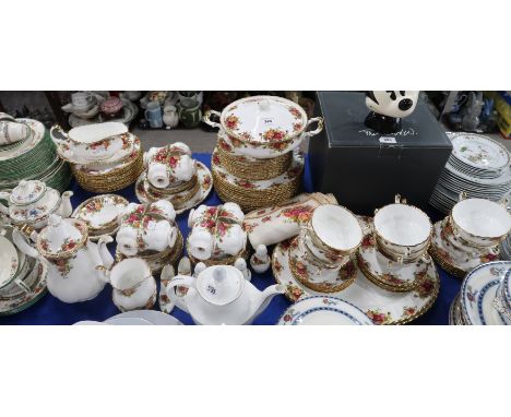 A Royal Albert Old Country Roses tea and dinner service comprising two meat platters, tureen and cover, dinnerplates, medium 